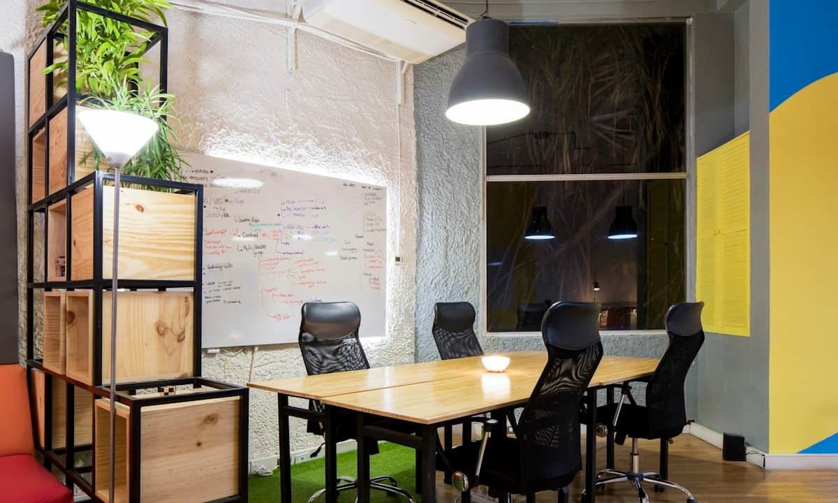 Empty meeting room with chairs and a whiteboard